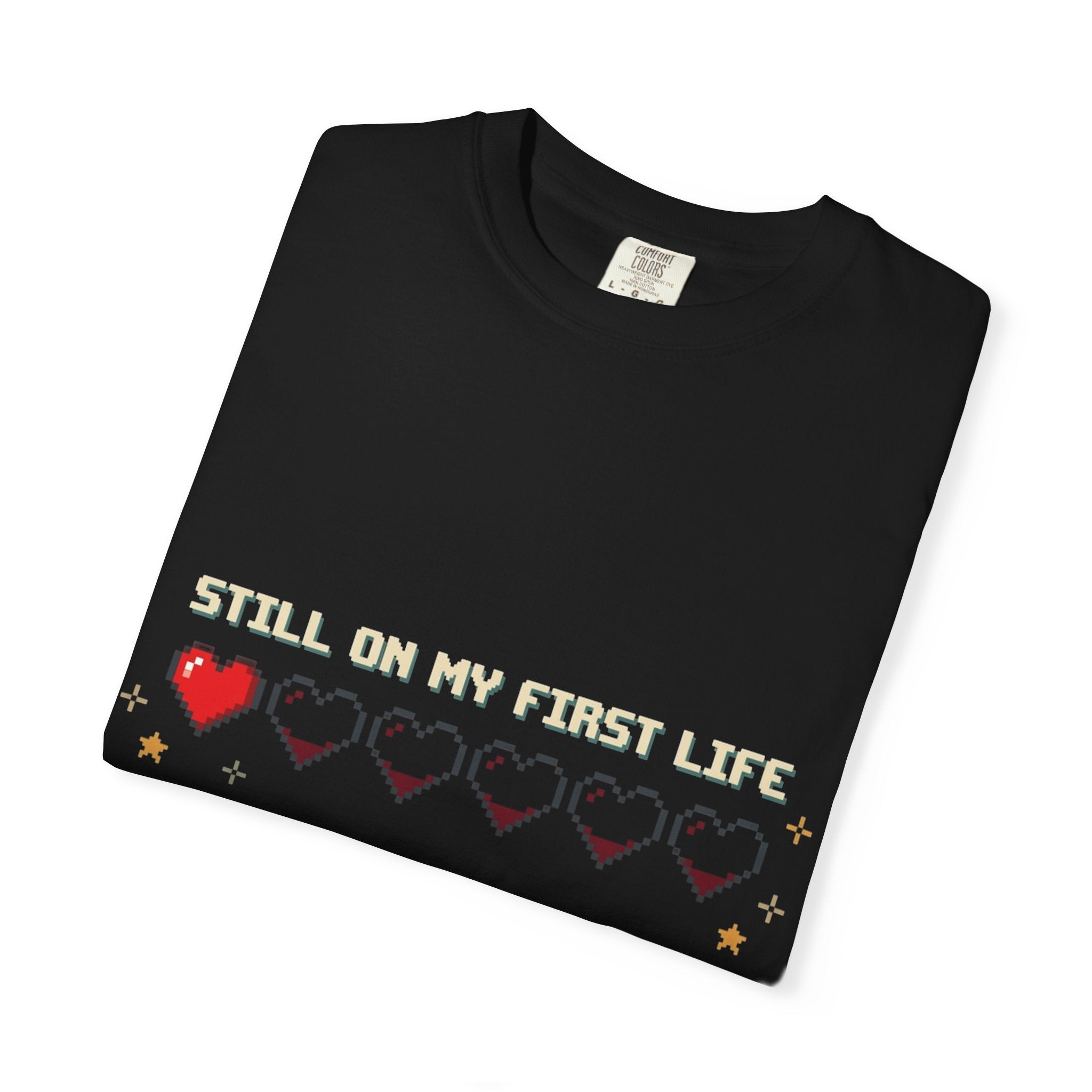 T-Shirt — "Still on My First Life" Pixel Heart Gaming Tee